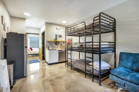 Boxcar 4
second floor
Private queen bedroom, full bathroom, efficiency kitchen, 6 bunkbeds with a flexible living and dining space.