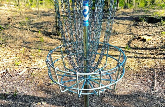 7 acres behind hotel 18 hole disc golf course