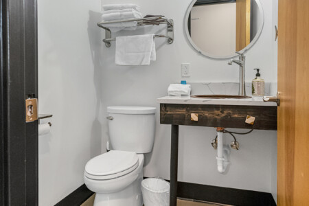 Half bathroom in room 2 shower rooms located just outside room