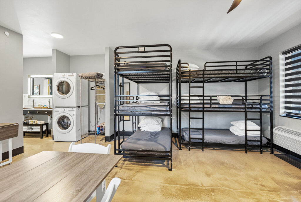 Flexible living space in 975 sq ft suite.  2 private queen rooms.  Kitchen, bathroom, laundry with a flexible living space.