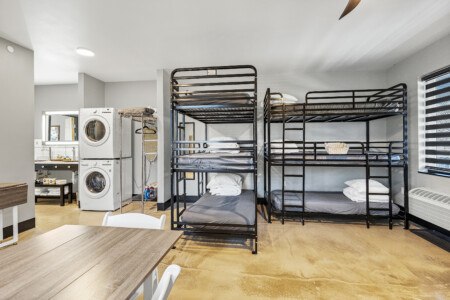 Flexible living space in 975 sq ft suite.  2 private queen rooms.  Kitchen, bathroom, laundry with a flexible living space.