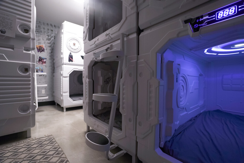 8 sleeping pods with a full bathroom.  Sleeping pods have lights and fans inside